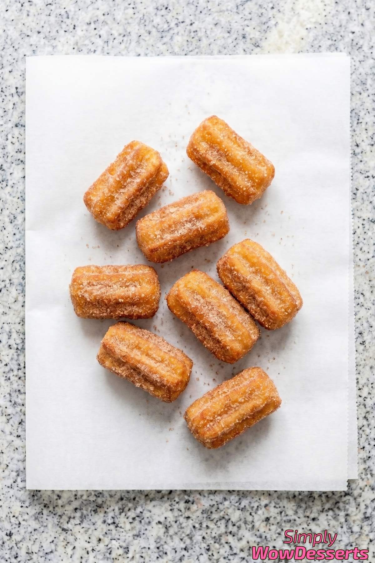 Irresistible churro bites with warm chocolate sauce
