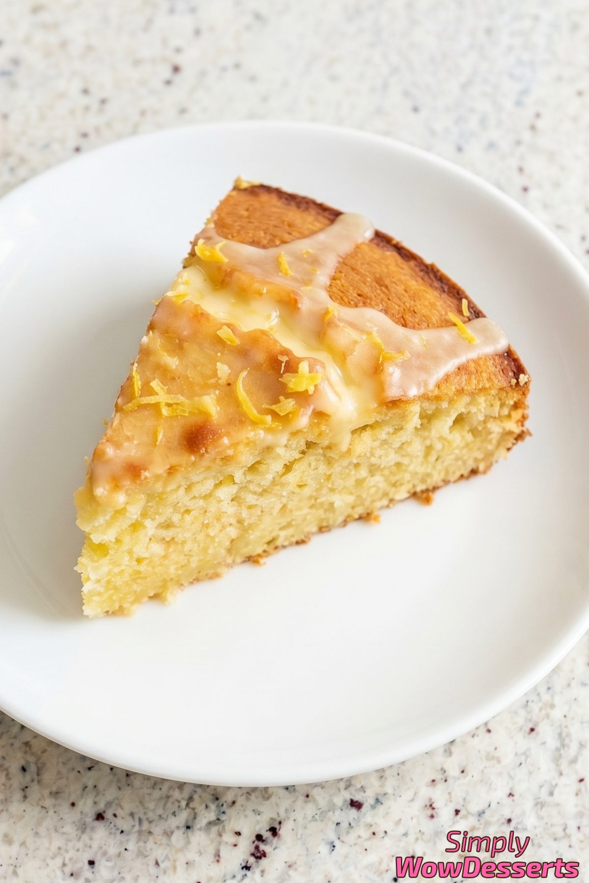 Decadent lemon ricotta cake with dusted sugar