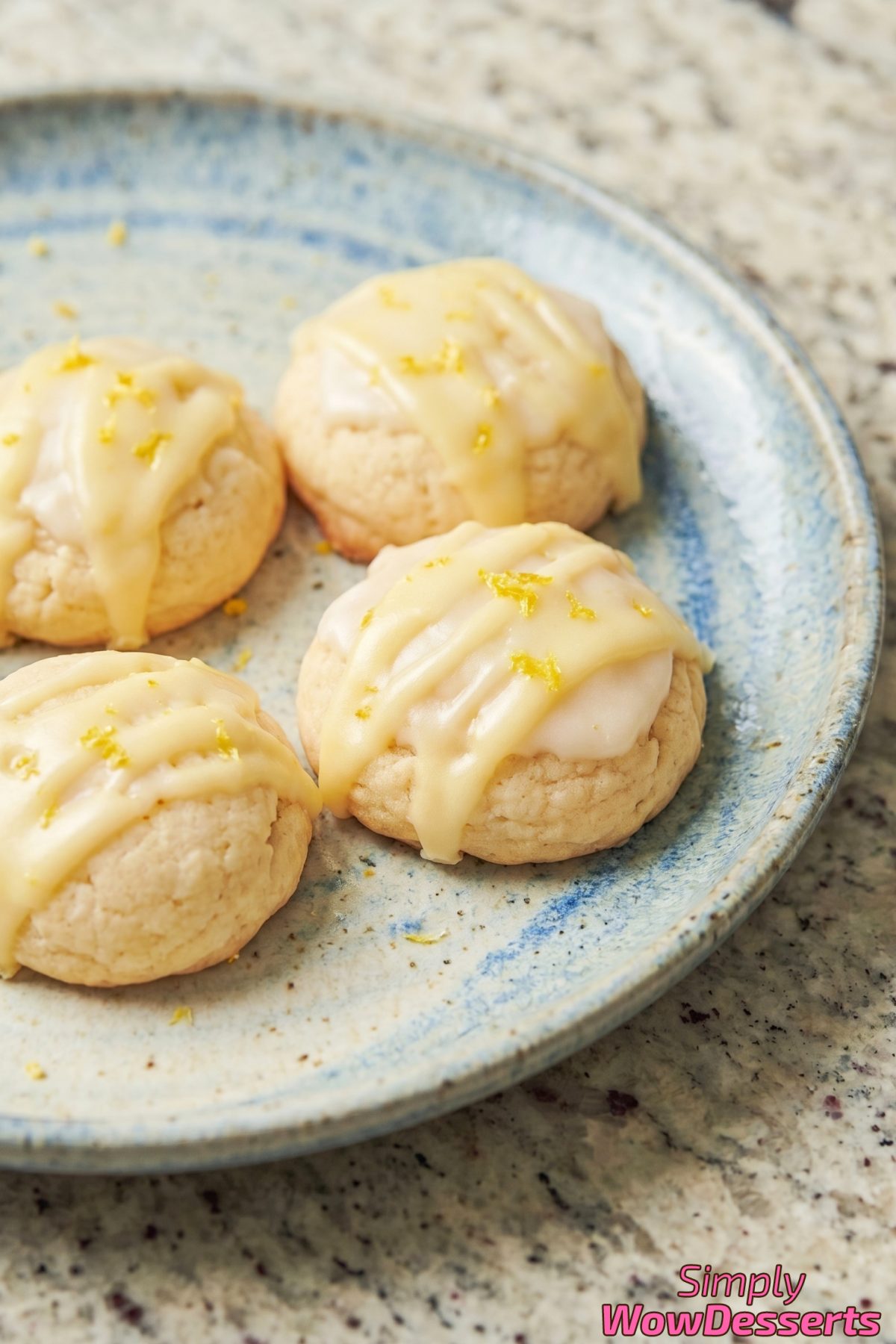 Tender Italian lemon cookies cooling on rack