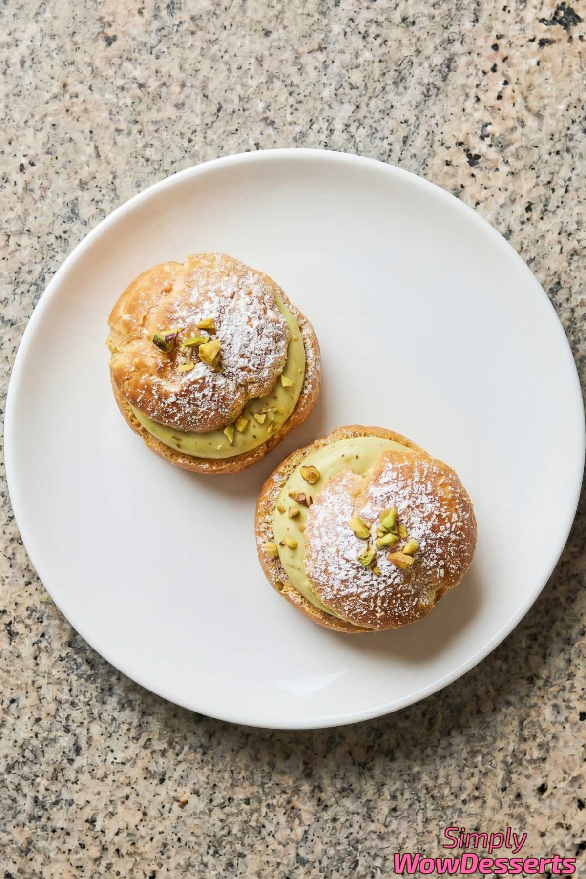 Nutty pistachio cream puffs fresh from oven