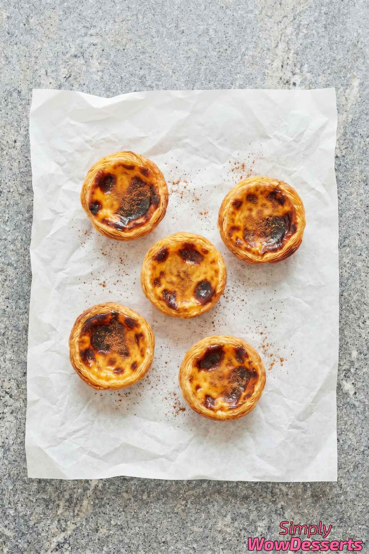 Silky Portuguese custard tarts in pastry shells