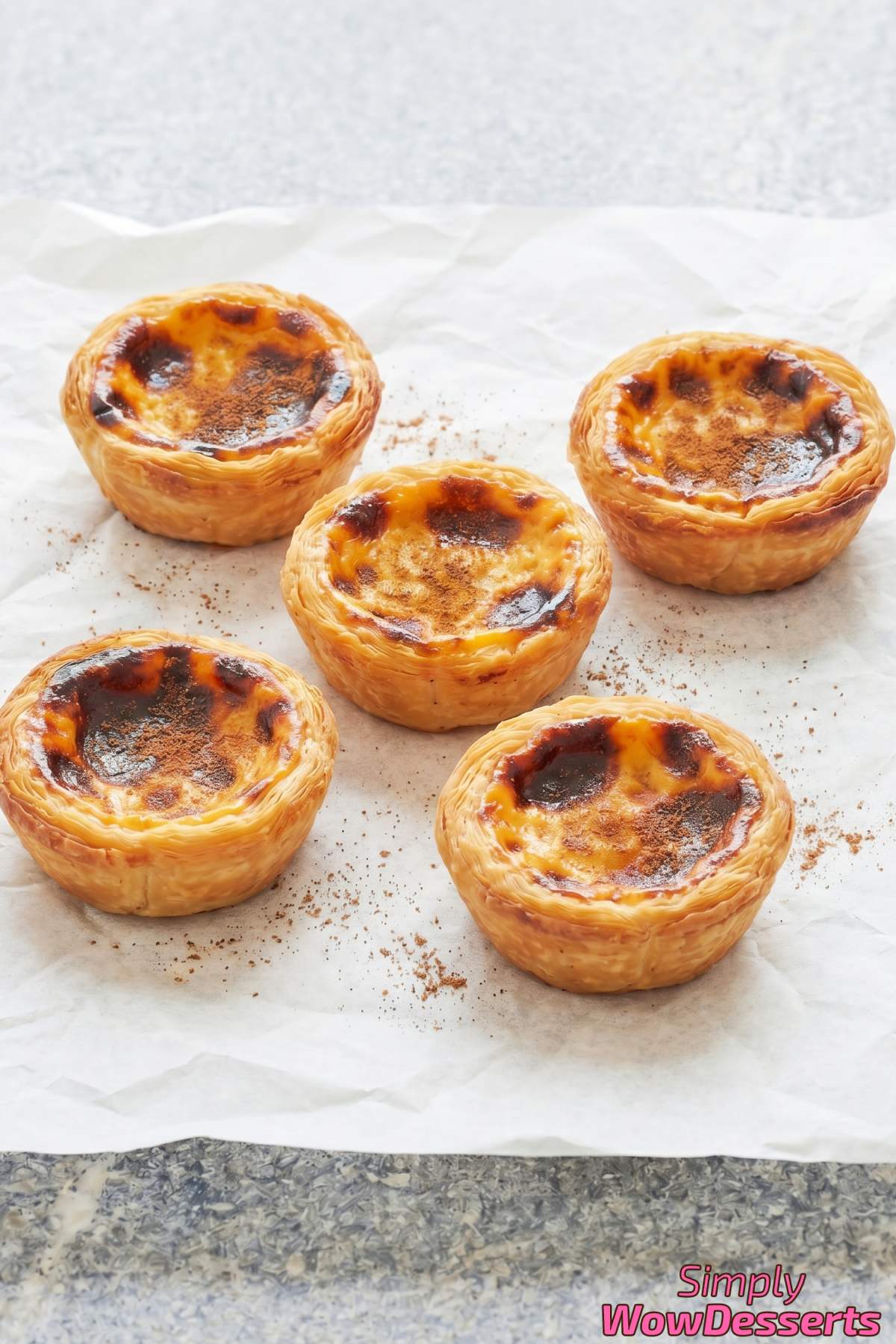 Traditional Portuguese custard tarts on plate