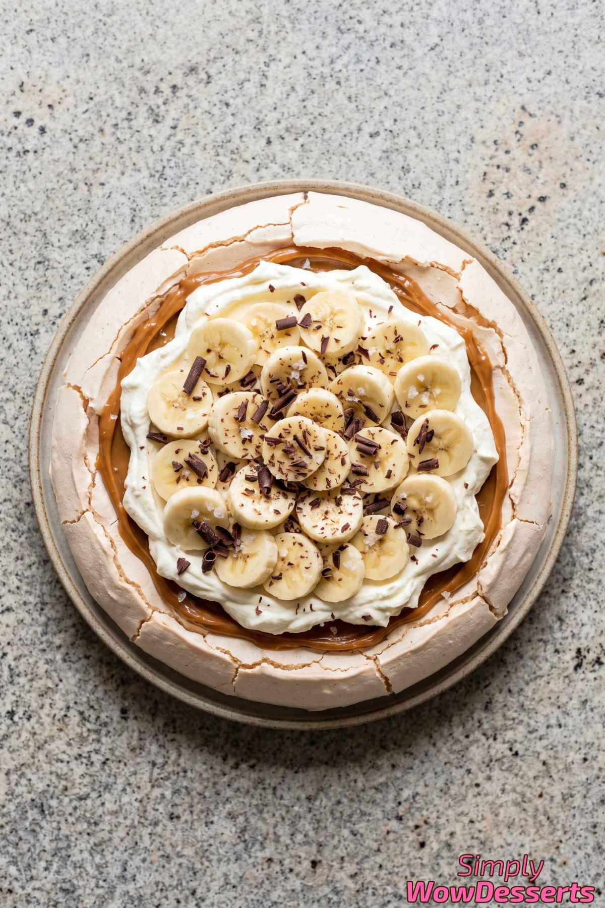 Banoffee pavlova topped with banana