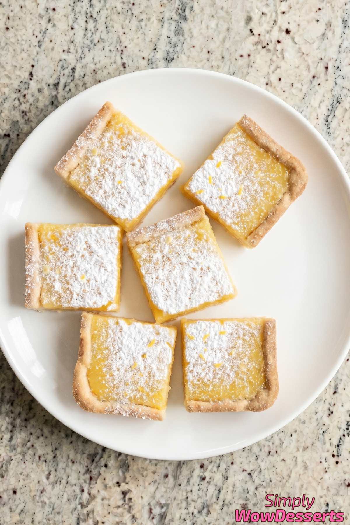 Simple classic lemon bars on parchment