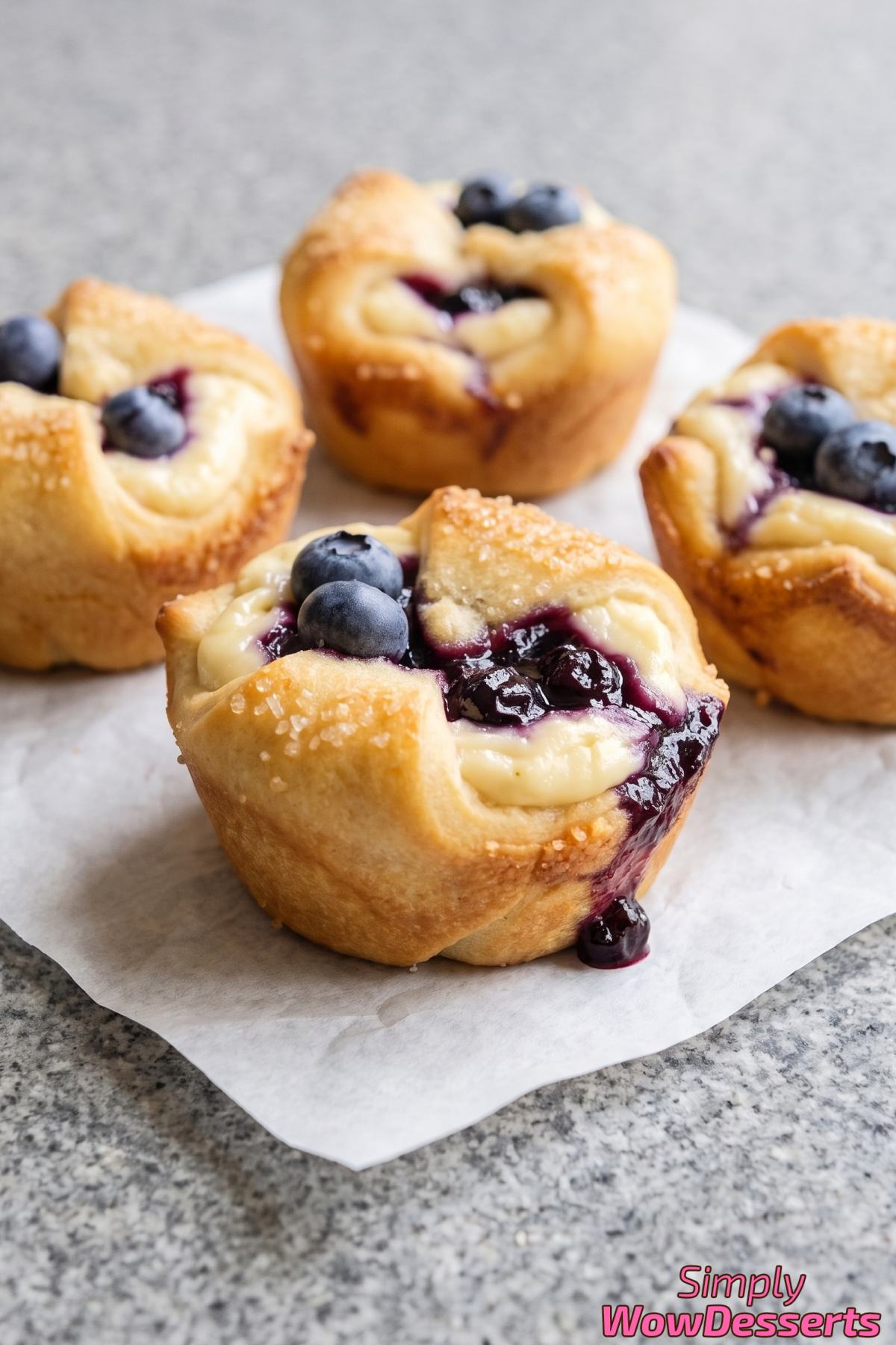 Flaky crescent bites with blueberry cheesecake