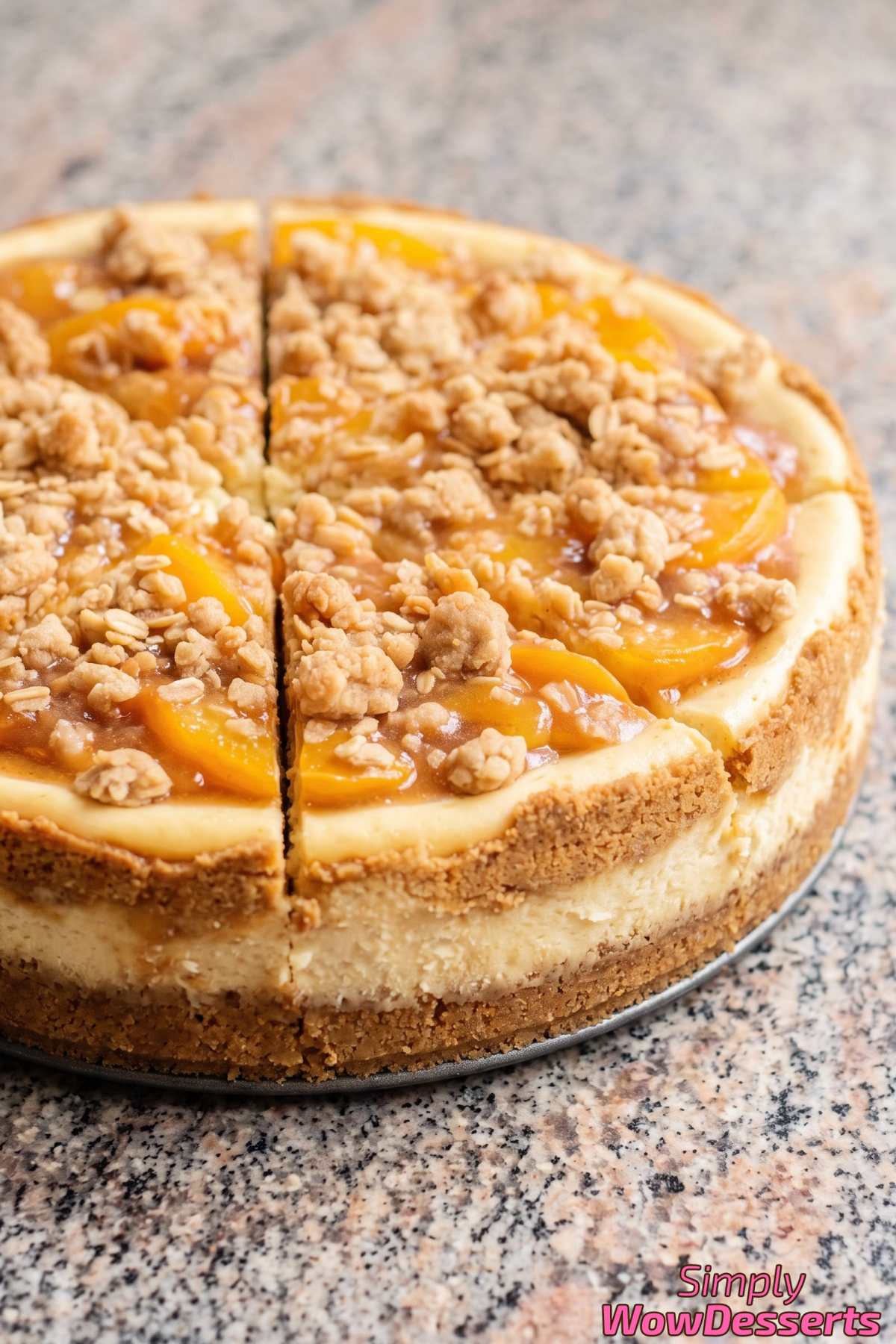 Baked peach cobbler cheesecake with crumble