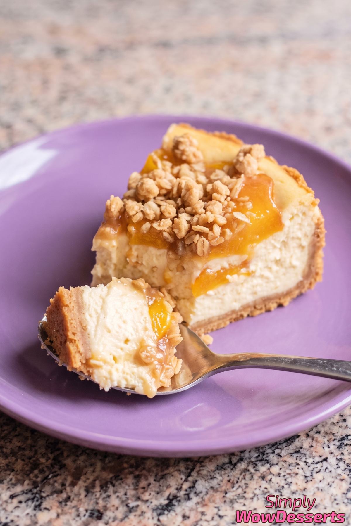 Sliced peach cobbler cheesecake dessert