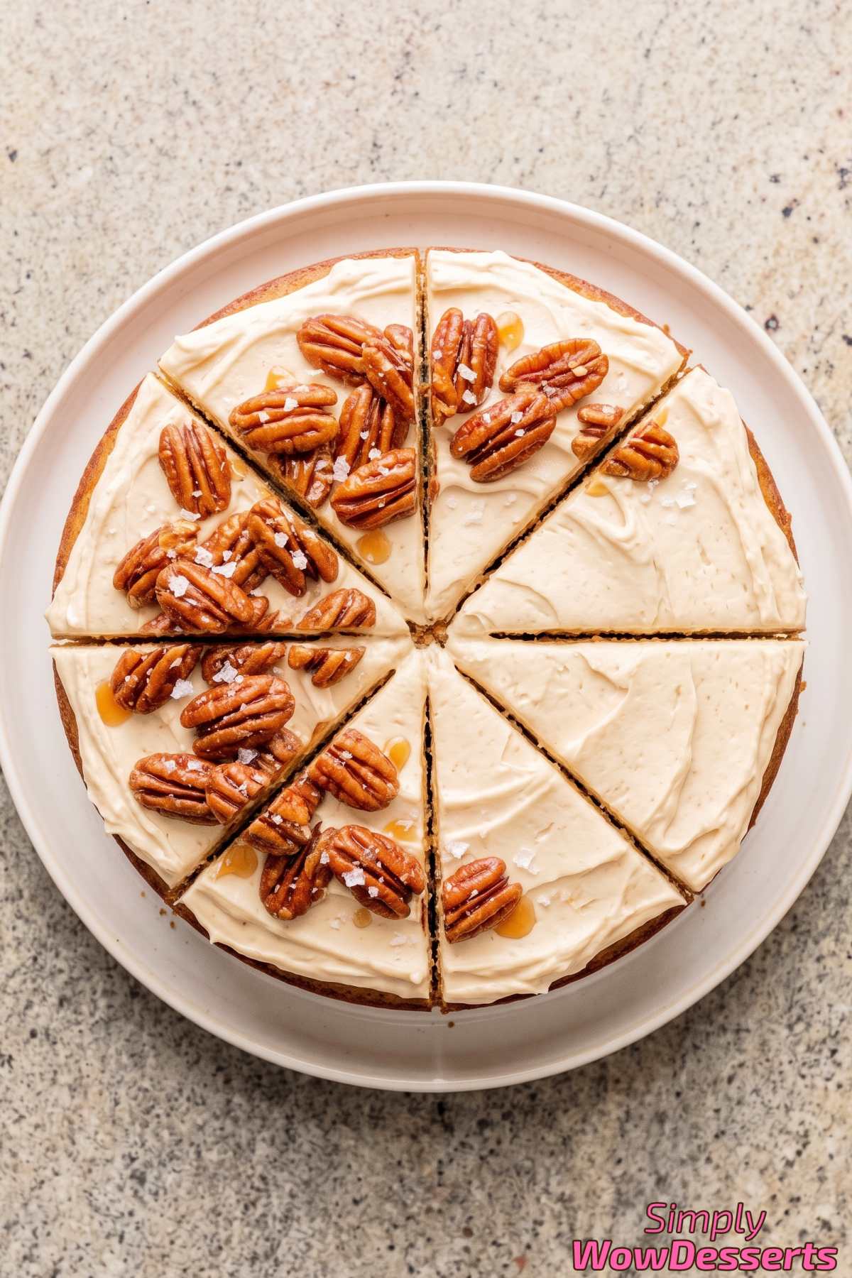 Frosted maple pecan cake close up